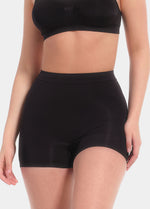 Person wearing a black Booty Booster Short on a white background