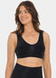 Woman wearing a black Shimmer Bra on a white background