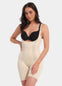 A model wearing the Latte Dream Shaper Dress with a strapless design and a seamless finish.
