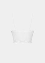 This product shows a white cozy crop top with V-neckline and lace detail, with ultra thin spaghetti straps. 