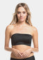 A woman wearing a black bandeau bra with a luxury satin look.