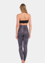 A model wearing the Doppio/black Gloss Legging. Showing the back view.