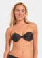 A woman wearing a black Backless Beauty adhesive bra.