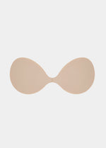 A latte backless, strapless adhesive bra with soft, smooth cups and front closure.