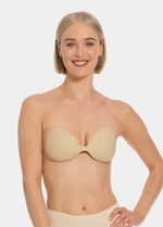 Woman wearing a latte strapless My MAGIC Bra against a white background