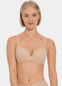 Woman wearing a cappuccino MAGIC Push-Up Bra against a plain background