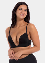 This image features a model wearing a V-Bra, which is designed to be nearly invisible under clothing with low plunge necklines. The bra boasts a deep cleavage front and an extra low back, making it ideal for seamless coverage.