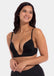 This image features a model wearing a V-Bra, which is designed to be nearly invisible under clothing with low plunge necklines. The bra boasts a deep cleavage front and an extra low back, making it ideal for seamless coverage.