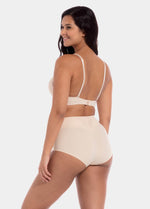 This image features a model wearing a V-Bra, which is designed to be nearly invisible under clothing with low plunge necklines. The bra boasts a deep cleavage front and an extra low back, making it ideal for seamless coverage.