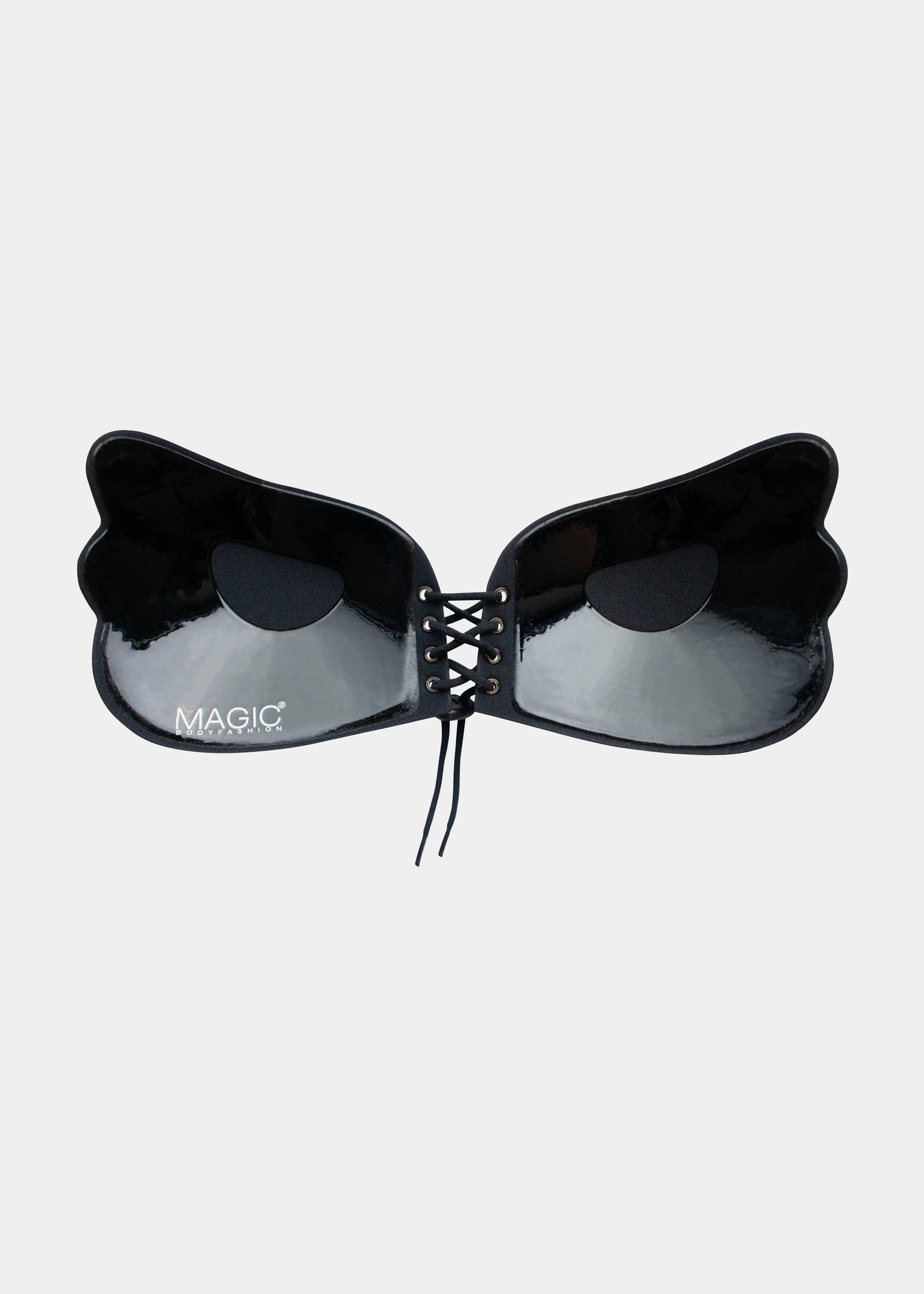 Inside of a black, backless, strapless adhesive bra with a drawstring front closure.