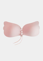 Rose, backless, strapless adhesive bra with a drawstring front closure.