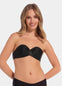A woman wearing a black wing bra with adhesive backless design, showing the front with the additional support wing.