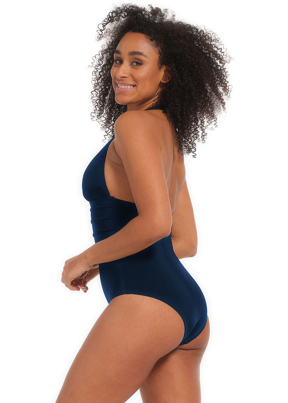 Woman wearing a navy blue one-piece swimsuit on a white background