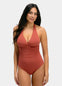 Woman wearing a sunset colored swimsuit on a white background