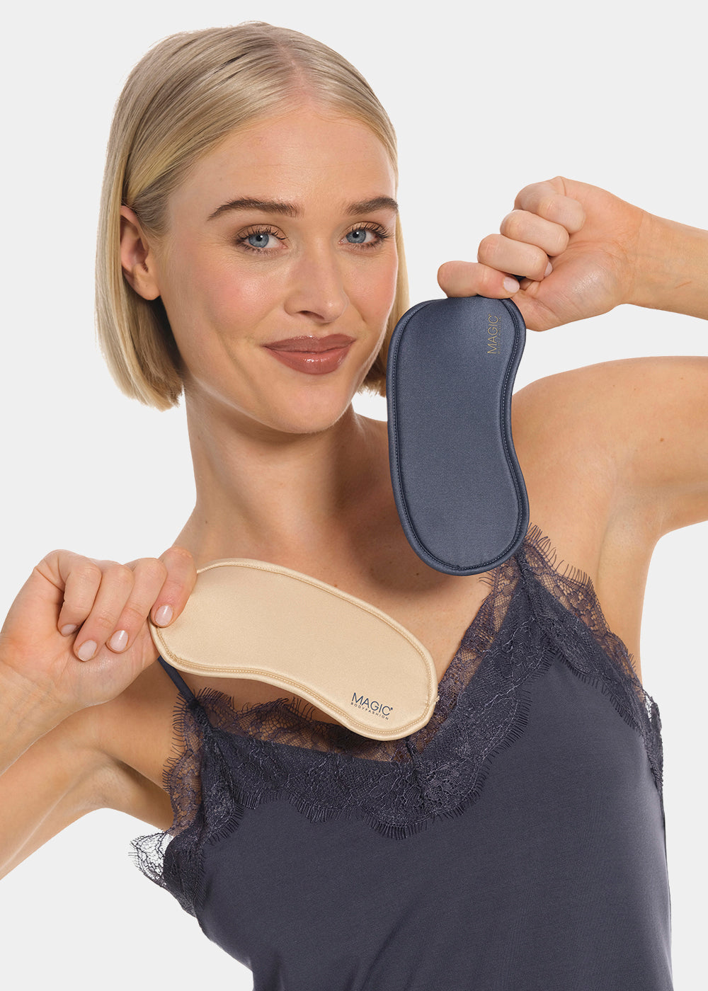Woman holding a beige and blue MAGIC Eye Mask against a white background